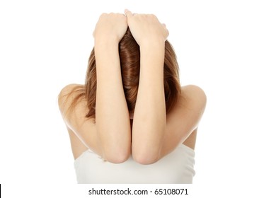 Scared Teen Girl Hiding Her Self In Her Hands, Isolated On White.