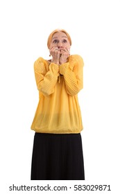 Scared Woman Covering Mouth. Frightened Senior Lady Isolated. Do Not Panic.