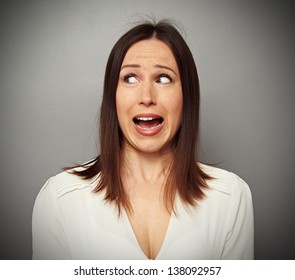 Scared Woman Looking At Something At Screaming