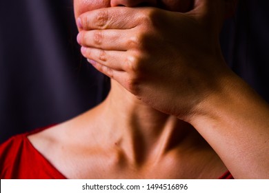 Scared Woman Shut Her Mouth With Her Hand