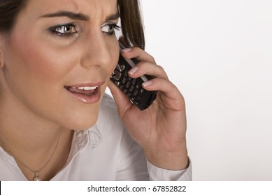 Scared And Worried Business Woman Talking On The Phone. Close Up. Not Isolated.