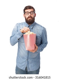 Scared Young Man With Popcorn