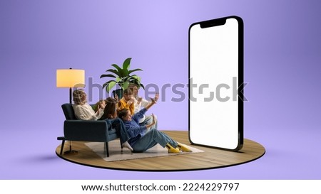 Scared young people, emotional friends watching horror movie together over purple background. Youth sitting on sofa in front of huge 3D model of cellphone screen. Concept of sport, leisure activities