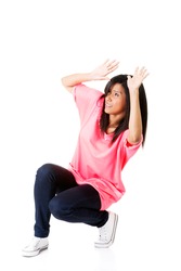 Young Indian girl scared of something, isolated over color background ...