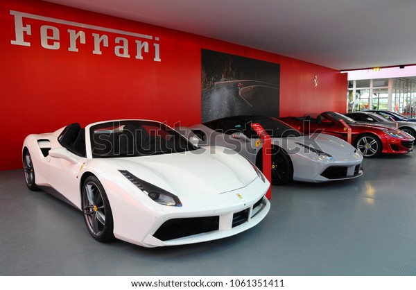 Scarperia\
(Florence), Italy - March 2018 : Ferrari cars on display in the\
Mugello paddock. Ferrari S.P.A. is an Italian luxury sports car\
manufacturer, founded by Enzo\
Ferrari.