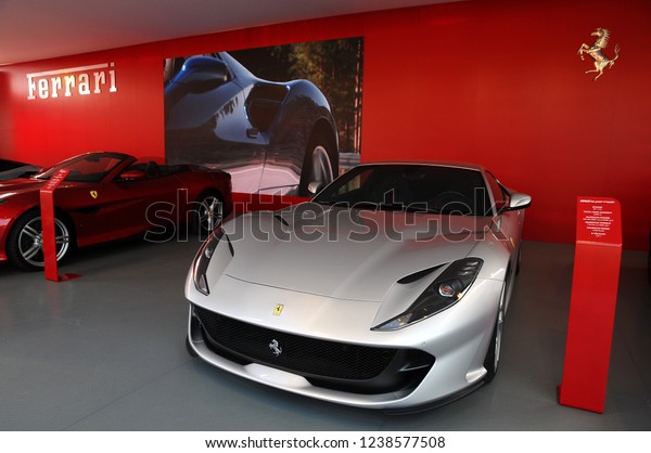 Scarperia\
(Florence), Italy - March 2018 : Ferrari cars on display in the\
Mugello paddock. Ferrari S.P.A. is an Italian luxury sports car\
manufacturer, founded by Enzo\
Ferrari.