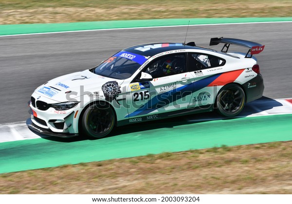 Scarperia, IT July 2,\
2021: BMW M4 GT4 of Team Ceccato Motor drive by Neri - Fascicolo -\
Nilsson in action during Qualifyng session of Italian Championship\
GT in Mugello\
Circuit.