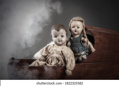 Scary Abandoned Old Baby Dolls In A Cradle With Misty Smoke