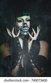 Scary Assasin Undead Woman With Finger Claw Studio Shot