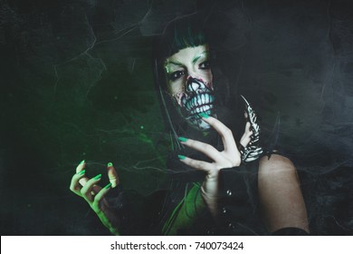 Scary Assasin Undead Woman With Finger Claw Studio Shot