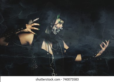 Scary Assasin Undead Woman With Finger Claw Studio Shot