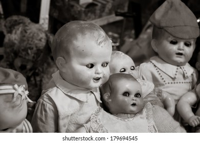 Scary Baby Doll Smiling And Looking Sideways