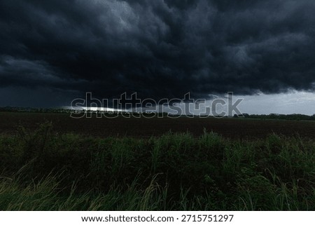 A Scary Cloud Over a Field