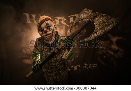 Scary clown with ax. The clown suit.