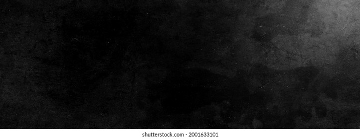 Scary dark wall, low light black concrete cement texture for background - Shutterstock ID 2001633101