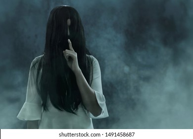 Scary Ghost Woman On Dark Background