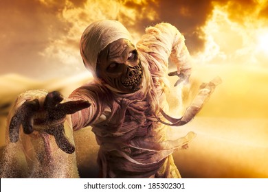 Scary Halloween Mummy In Hot Desert With Dramatic Lighting