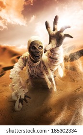 Scary Halloween Mummy In Hot Desert With Dramatic Lighting