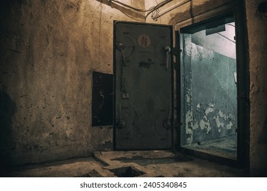 Scary interior of an abandoned bunker. Shabby walls. Low light. Dark abandoned bunker. - Powered by Shutterstock