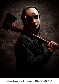 Scary Man With Mask Holding An Axe