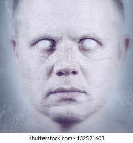 Scary Man With White Eyes In Ice / Stone.