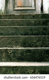 Scary Old Dark Stairs To Closed Door.