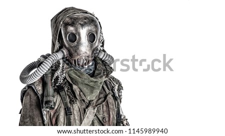 Scary post apocalyptic, living underground, creature with vintage lantern on shoulder, wearing rags and creepy full-face gas mask under tattered hood, studio shoot isolated on white with copy space