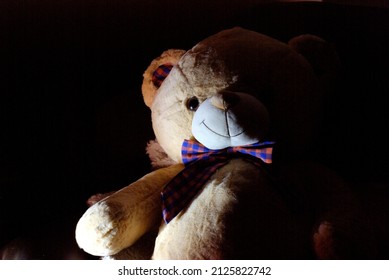 Scary Teddy Bear In A Darkened Room