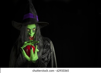 Scary Witch With A Poisonous Apple.