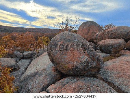 Scattered across a granite hilltop, these ancient boulders at Elephant Rocks State Park reveal the sculpting power of nature through eons of weathering and time.