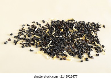 Scattered Black Ceylon Tea On A Craft Substrate