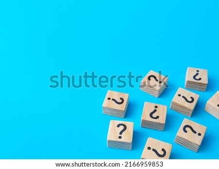 Scattered blocks with a question mark. Lots of unknown facts. Analytics and analysis of information. Curiosity, exploration. Induction, deduction. Confusing business. Questions and problem solving.