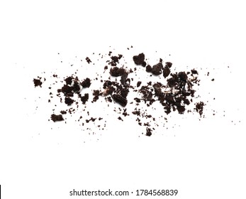 Scattered Crumbs Of Chocolate Sandwich Cookies Filled With Sweet Cream Flavored Isolated On White Background.