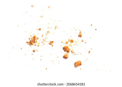 Scattered crumbs of vanilla chip butter cookies isolated on white background. Close-up view of brown crackers. Macro shot of yellow biscuit cake leftovers for your design - Shutterstock ID 2068654181