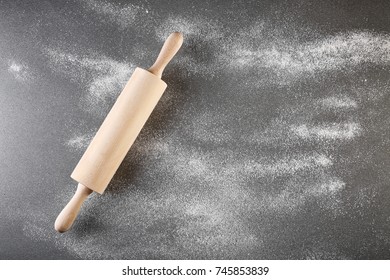 Scattered Flour And Rolling Pin On Gray Background