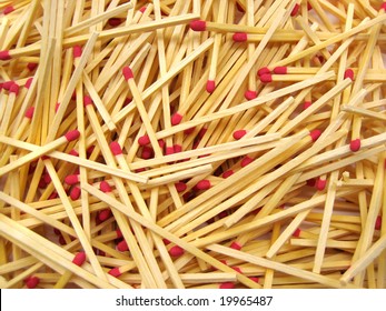 A scattered pile of red-tipped cooks matches