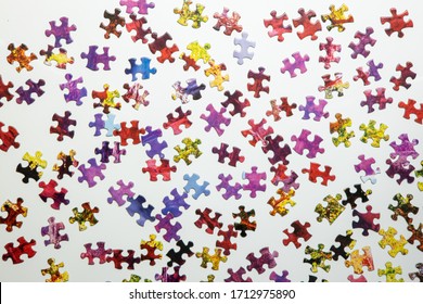 
Scattered Puzzle Pieces Isolated On A White Background