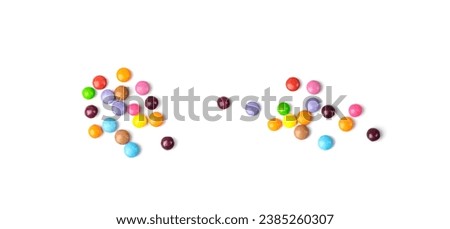 Scattered small candies isolated. Colorful dragees, multicolored glazed chocolate buttons, various dragee collection, rainbow candies on white background