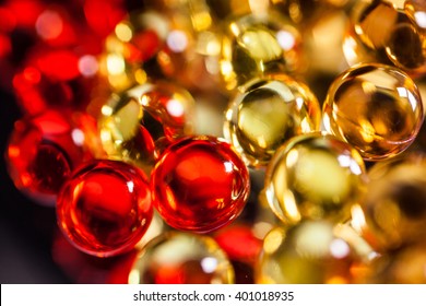 a scattering of colored capsules and tablets, close-up, photograph with depth of field