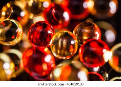 a scattering of colored capsules and tablets, close-up, photograph with depth of field