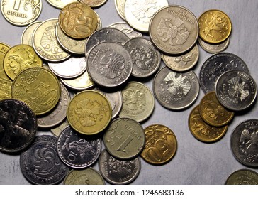 Scattering of different coins