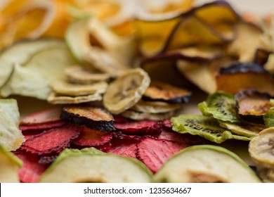 Scattering of different dried fruits. Фруктовый фон. Размытые фрукты. Mix dried fruit background.
