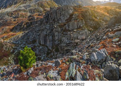 Scattering of stones, granite rock. Rocky mountain slope, chaotic mountain landscape.