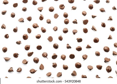 Scattering of tasty chocolate chips on white background - Shutterstock ID 543920848