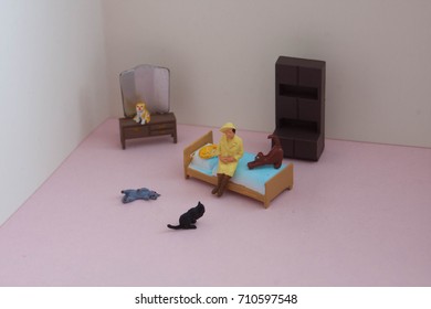 Scene Created With Miniature Toy People. Stereotype Of The Lonely Or Crazy Cat Woman. Lady With Many Cats In Her Apartment Or House. How Many Cats Is Too Many Cats?