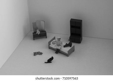 Scene Created With Miniature Toy People. Stereotype Of The Lonely Or Crazy Cat Woman. Lady With Many Cats In Her Apartment Or House. How Many Cats Is Too Many Cats?