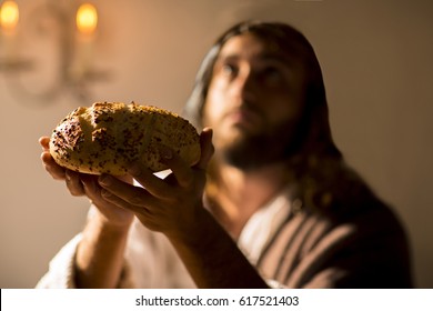 Scene, of Jesus Christ blessing the bread and wine during the last supper with his apostles 