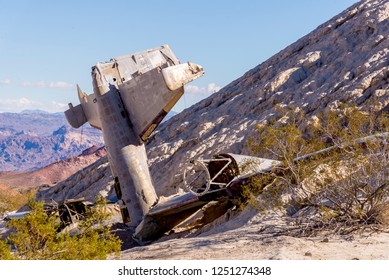 Scene of a plane crash in desert landscape