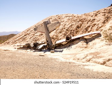 Scene Of A Plane Crash In Desert Landscape