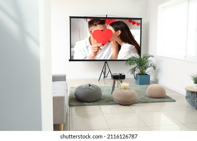 Scene Of Romantic Movie On Screen Of Video Projector At Home